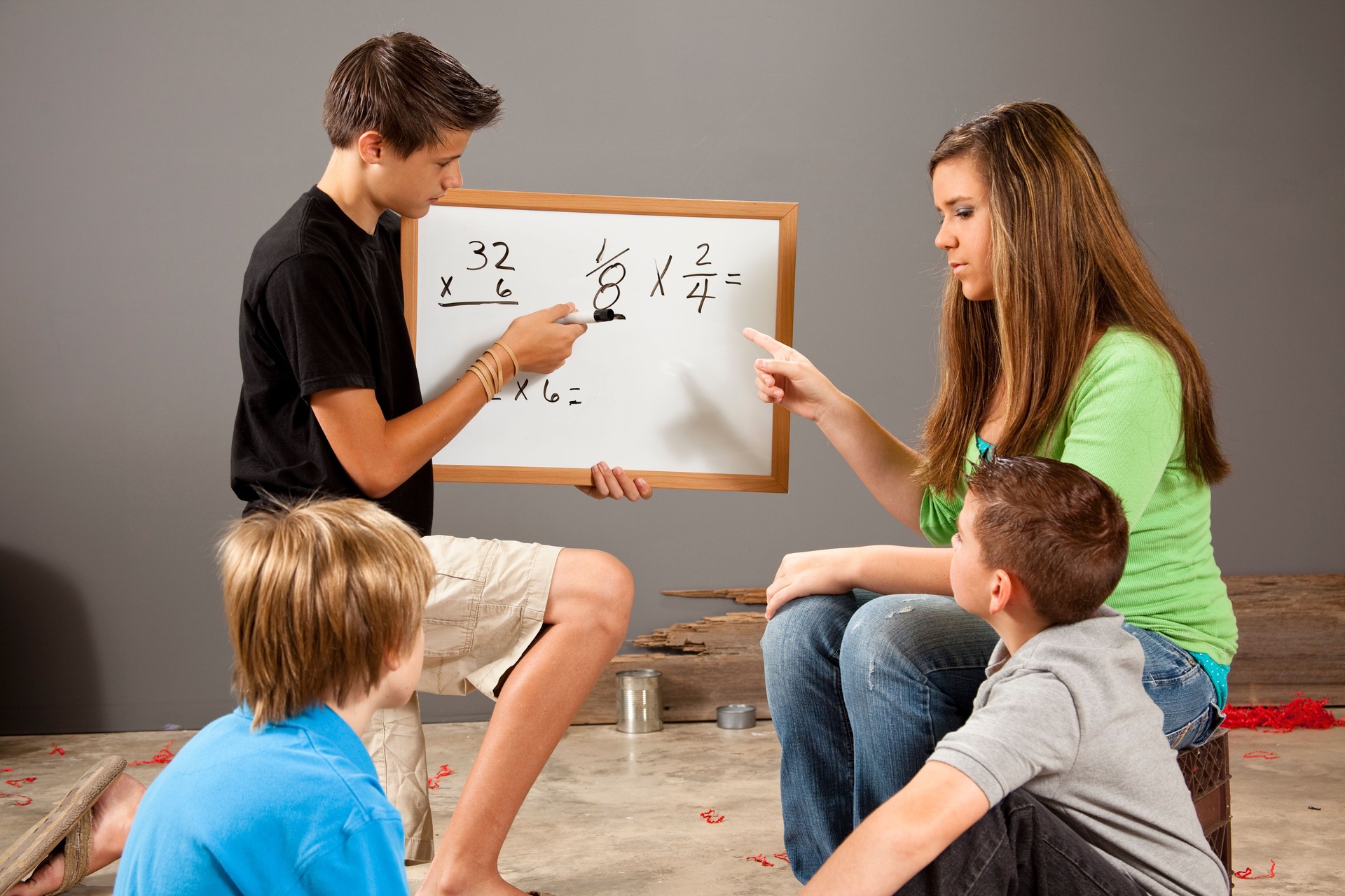 Teenagers mentoring elementary age boys